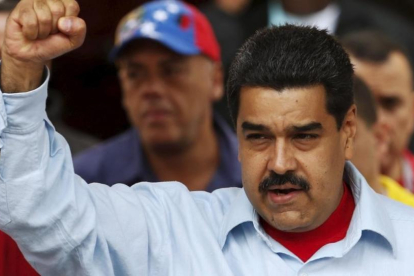 Maduro gesticula durante una manifestación contra la ley de amnistía, en el Palacio de Miraflores, en Caracas, el 7 de abril.-REUTERS / CARLOS GARCIA RAWLINS