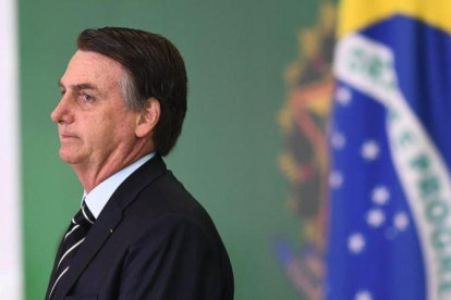 El presidente brasileño, Jair Bolsonaro, en una ceremonia en el palacio de Planalto, en Brasilia.-EVARISTO SA (AFP)