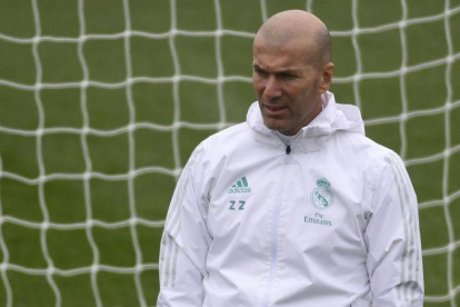 Zidane, en el entrenamiento de este martes en Valdebebas.-AFP / PIERRE-PHILIPPE MARCOU