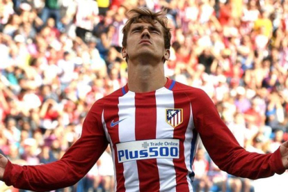 Antoine Griezmann celebra su gol al Deportivo, el quinto que marca en la Liga.-GERARD JULIEN / AFP