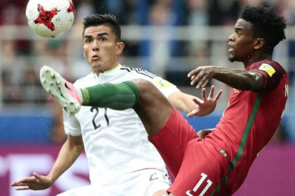 Nelson Semedo (derecha), con Portugal.-AP / DENIS TYRIN