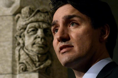 El Primer Ministro de Canadá Justin Trudeau dirigiéndose a los medios.-ADRIAN WYLD / AGENCIAS