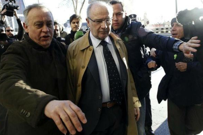 Rato llega a los juzgados de plaza de Catilla en febrero pasado.-EFE / CHEMA MOYA