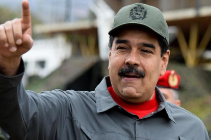 El presidente venezolano, Nicolás Maduro, en unos ejercicios militares el pasado 24 de febrero.-AFP / FEDERICO PARRA