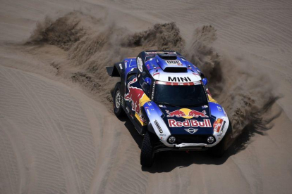 Carlos Sainz (Mini), se quedó sin opciones de repetir el triunfo del pasado año.-AFP