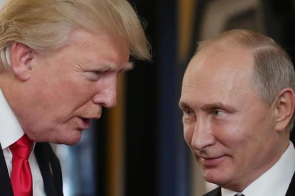 Trump y Putin en la cumbre de la APEC el pasado mes de noviembre.-AFP / MIKHAIL KLIMENTYEV