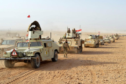 Las tropas de Irak después de liberar la ciudad de Rawa del Estado Islámico (EI). 17 de noviembre de 2017.-REUTERS / OSAMAH WAHEEB