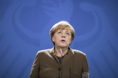 La cancillera alemana, Angela Merkel, antes de una rueda de prensa en Berlín.-MICHAEL KAPPELER