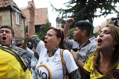 Los colombianos rechazan en referéndum el acuerdo de paz entre el Gobierno y las FARC,-