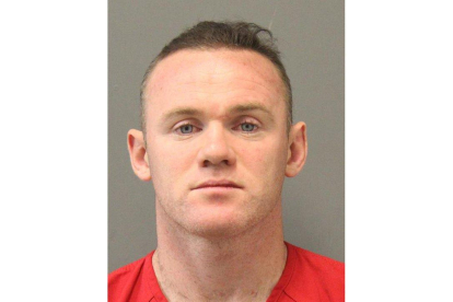 La foto policial de Rooney.-