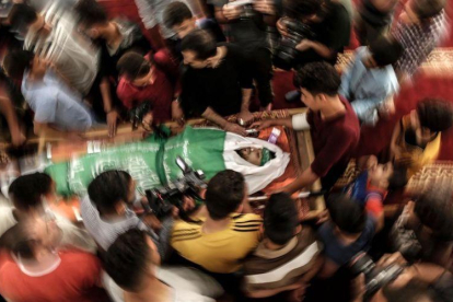 Entierro de uno de los fallecidos en Gaza.-AFP / MAHMUD HAMS
