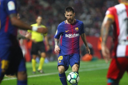 Leo Messi, en el Girona-Barça de la pasada temporada en Montilivi.-JORDI RIBOT / ICONNA
