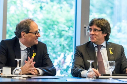 El president de la Generalitat, Quim Torra, y el expresidente Carles Puigdemont, en un encuentro en Berlín el pasado junio.-MARKUS HEINE