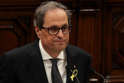 Quim Torra durante su discurso ante los diputados.-ALBERT GEA (REUTERS)