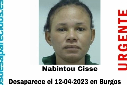 Cartel de  SOS Desaparecidos con la imagen de la mujer desaparecida. ECB