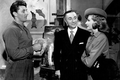 Robert Mitchum, Ricardo Cortez y Laraine Day.