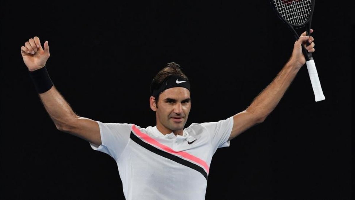Federer celebra su victoria.-AFP / PAUL CROCK