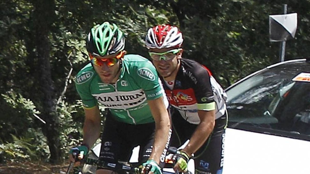 Carlos Barbero junto a Juan Carlos Riutort en la pasada Vuelta a Burgos.-SANTI OTERO