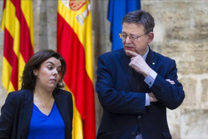 La vicepresidenta del Gobierno, Soraya Sáenz de Santamaría, y el presidente de la Generalitat Valenciana, Ximp Puig, este martes, 31 de enero, en Valencia.-MIGUEL LORENZO