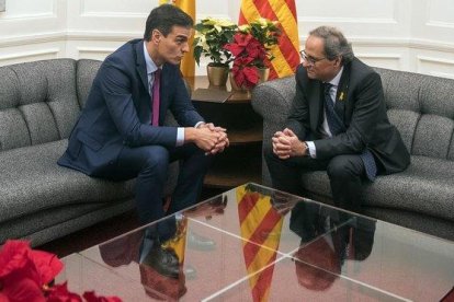 Pedro Sánchez y Quim Torra, durante su encuentro en el Palau de Pedralbes, el pasado 20 de diciembre.-JORDI COTRINA