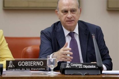 El ministro Jorge Fernández Díaz, durante su comparecencia en la comisión de Interior del Congreso de los Diputados.-JOSÉ LUIS ROCA