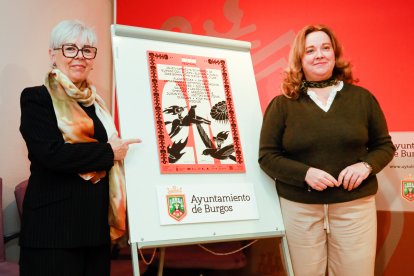 La presidenta de Parkinson Burgos, Chus Delgado, y la alcaldesa, Cristina Ayala, posan junto al cartel del evento