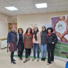 María Jesús González, tercera por la izquieda, con su equipo de junta directiva del Colegio Oficial de Trabajo Social.