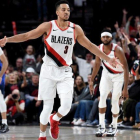 CJ McCollum celebra una de sus canastas en el partido de las cuatro prórrogas-STEVE DYKES (AFP)