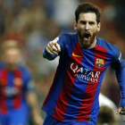 Messi celebra un gol al Madrid en el Bernabéu, esta temporada.-AFP