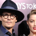 Johnny Depp y su ya esposa, Amber Heard, en una reciente 'premiere'.-Foto: AFP