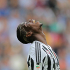 Paul Pogba se lamenta durante un partido con la Juventus.-AFP / MARCO BERTORELLO