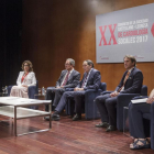 El consejero de Sanidad, en el centro, acudió ayer al congreso de la Sociedad Castellano y Leonesa de Cardiología.-ISRAEL L. MURILLO