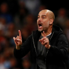 Pep Guardiola, durante el partido contra el Nápoles.-REUTERS