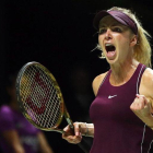 El grito de la victoria de Elina Svitolina, tras vencer a Stephens en Singapur.-WALLACE WOON