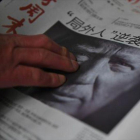 Trump, en la portada de un diario de Pekín.-AFP/GREG BAKER