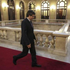 El 'president' Carles Puigdemont, en el Parlament para asistir a una sesion de control al Govern.-DANNY CAMINAL