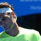 Roger Federer, tras perder un punto durante su partido de tercera ronda contra Andreas Seppi.-Foto: AFP / MAL FAIRCLOUGH