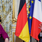 Merkel y Macron, este viernes, en París.-REUTERS / CHRISTOPHE PETIT