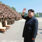 El líder de Corea del Norte, Kim Jong Un, este jueves durante una sesión de fotos.-Foto: AFP