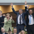 (L-R)  UEFA President Michel Platini, German Chancellor Angela Merkel, president of the German soccer federation (DFB) Wolfgang Niersbach and German Interior Minister Hans-Peter Friedrich react after a goal that was disallowed during the quarter-final soc-PETER ANDREWS / REUTERS