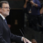 El presidente del Gobierno en funciones y candidato a la reelección, Mariano Rajoy, durante su discurso en el debate de investidura.-EFE / BALLESTEROS