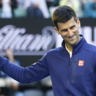 Novak Djokovic en el Grand Slam de Melbourne contra el francés Giles Simon.-EFE / MADE NAGI