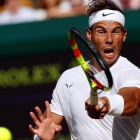 Nadal conecta un golpe en la semifinal ante Federer.-ADRIAN DENNIS POOL