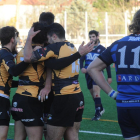 Los jugadores del UBU Colina Clinic celebran un ensayo.-ISRAEL L. MURILLO