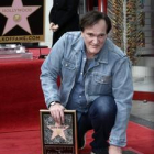 Quentin Tarantino posa junto a su estrella.-PAUL BUCK / EFE