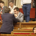 El 'president' Carles Puigdemont junto a Jordi Sànchez (ANC).-JULIO CARBO