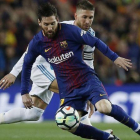 Sergio Ramos y Lionel Messi en el último Clásico en el Camp Nou-MANU FERNANDEZ