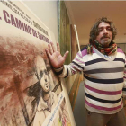 Santiago Cartujo, junto al cartel del largometraje, ayer durante la rueda de prensa.-Raúl Ochoa