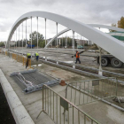 Las obras del puente de las Rebolledas presentaban ayer este estado ya con un primer asfaltado concluido.-ISRAEL L. MURILLO