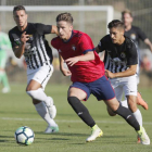 Un lance del encuentro disputado entre Osasuna y Burgos CF en Olite-Jesús Garzaron / Diario de Navarra